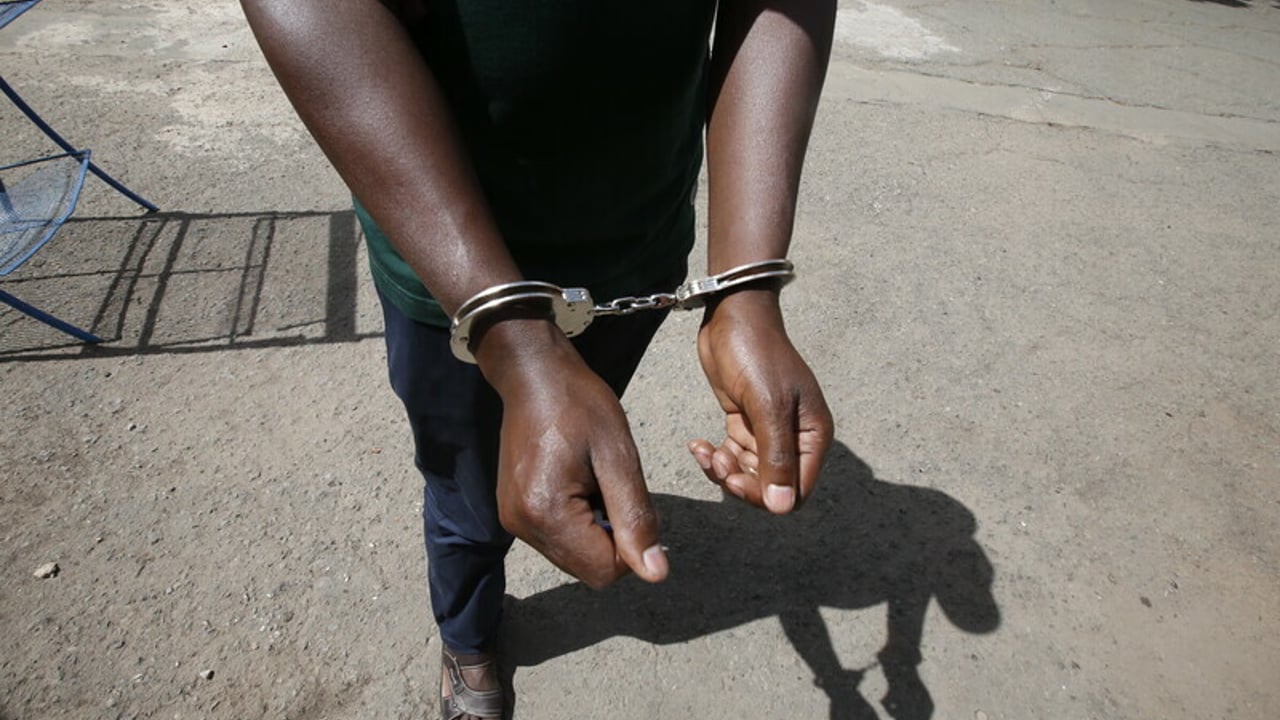 Handcuffs 2021 10 Kenya stock photoshoots Monica Mwangi Approved for Full Use