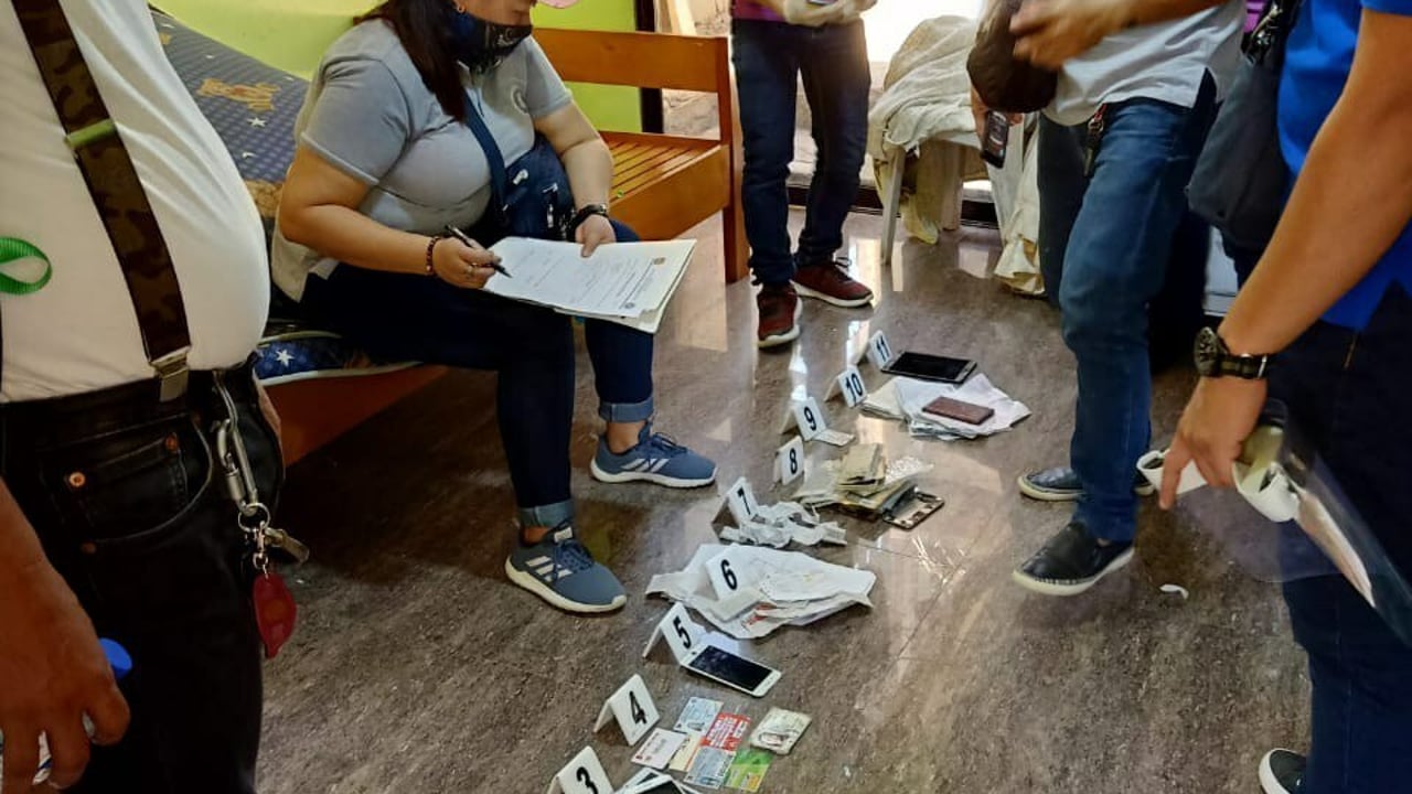 Operatives examining seized evidence Photo by WCPC MFU jpeg2020 05 PHP arrest in Mindanao 13 rescued 2020 05 PHP arrest in Mindanao 13 rescued Approved for Full Use