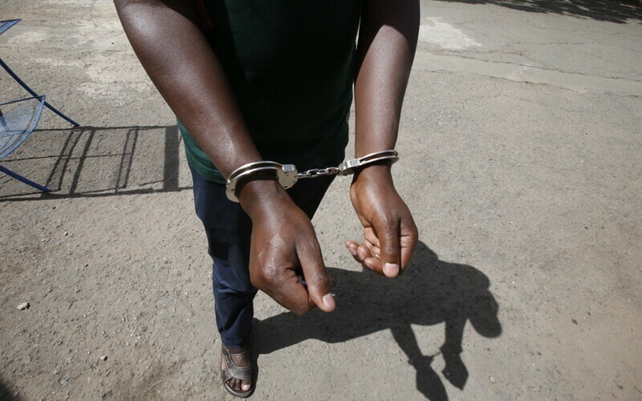 Handcuffs 2021 10 Kenya stock photoshoots Monica Mwangi Approved for Full Use