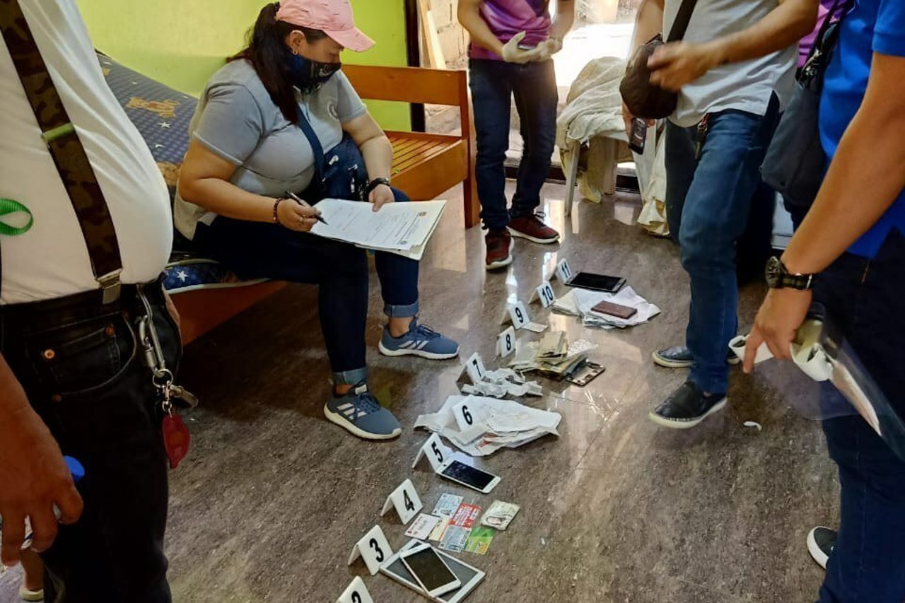 Operatives examining seized evidence Photo by WCPC MFU jpeg2020 05 PHP arrest in Mindanao 13 rescued 2020 05 PHP arrest in Mindanao 13 rescued Approved for Full Use