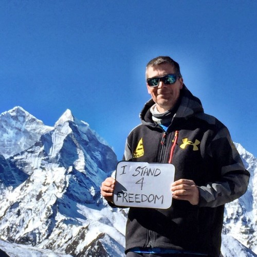 Nick Cienski #Stands4Freedom at 17,000 feet on Everest.